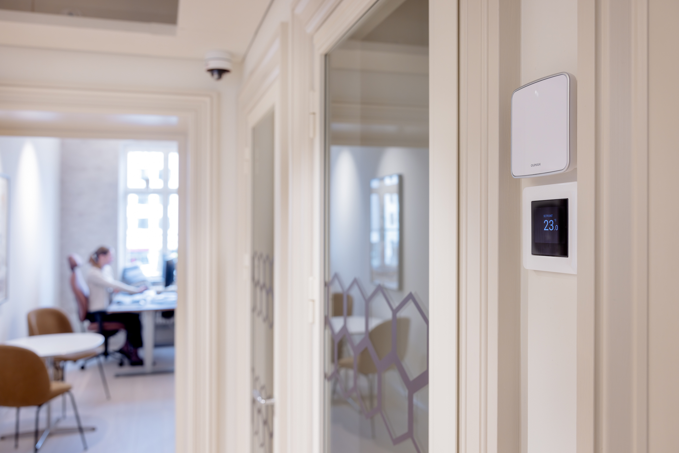 Ouman sensor and room thermostat